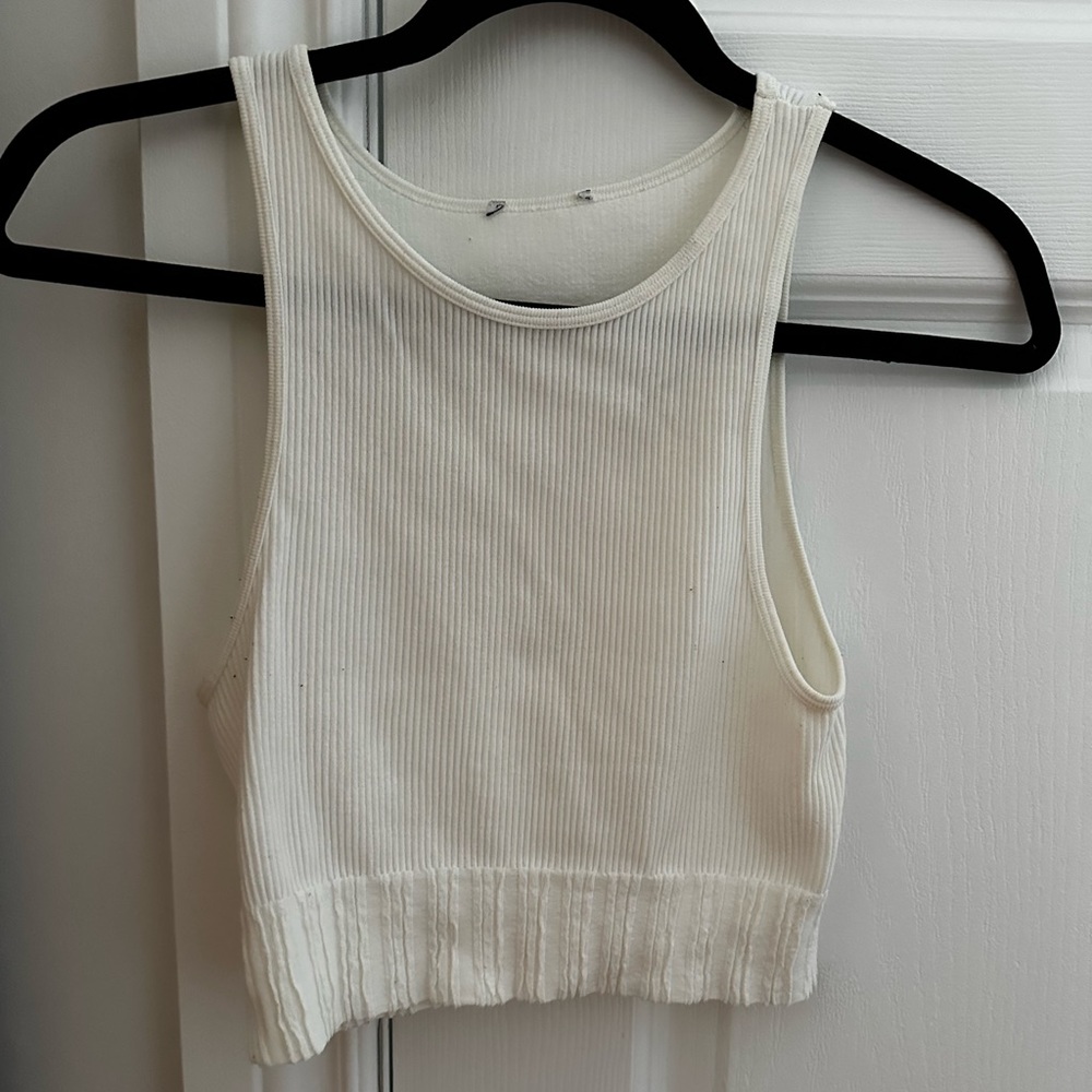 Off white coloured tank top from Zara. Only worn a few times. Great condition